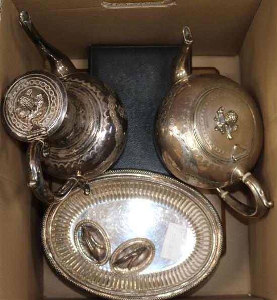 A pair of plated entree dishes, two silver plated tea/coffee pots, cased set of dessert eaters and a cased set of cake knives